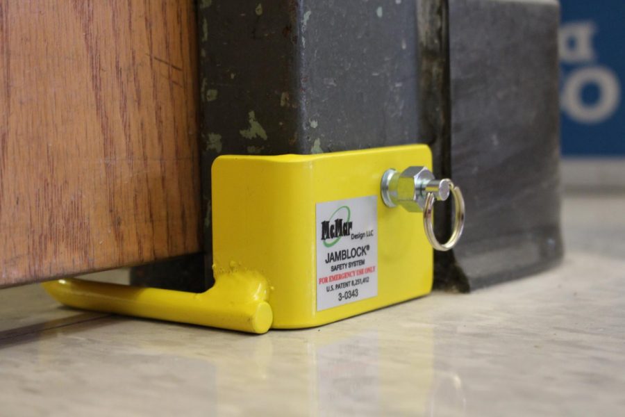 A Jamblock is placed on a door to prevent intruders from entering the room, as shown above. 