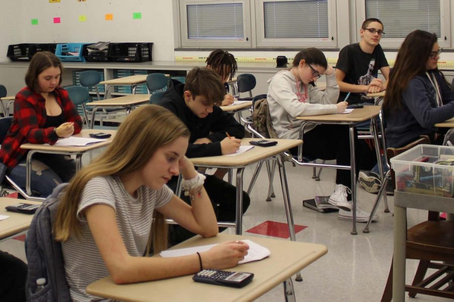 Ms. Koutsourais eighth grade students take a math test during class on Jan. 24.