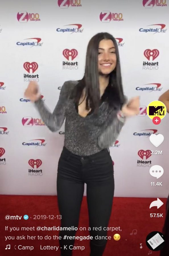 TikTok star Charli Damelio dances for MTV to the currently trending song “Lottery” in this screenshot from TikTok.