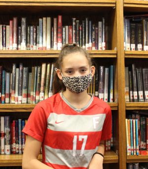  Kendall Climo, seventh grader, in the library wearing a mask on Sept. 15, 2021.   