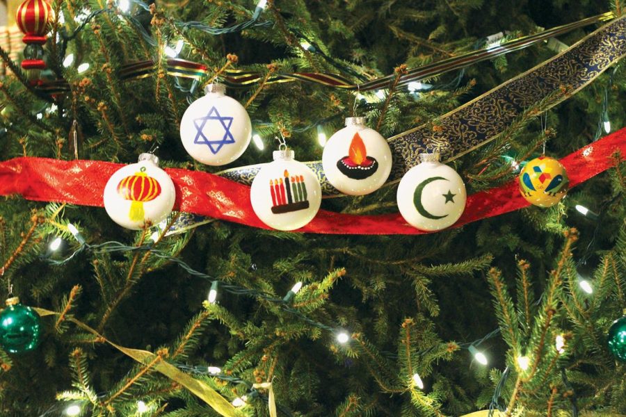 Ornaments+from+minority+religious+groups+decorate+a+pine+tree+to+reflect+on+religious+holidays.