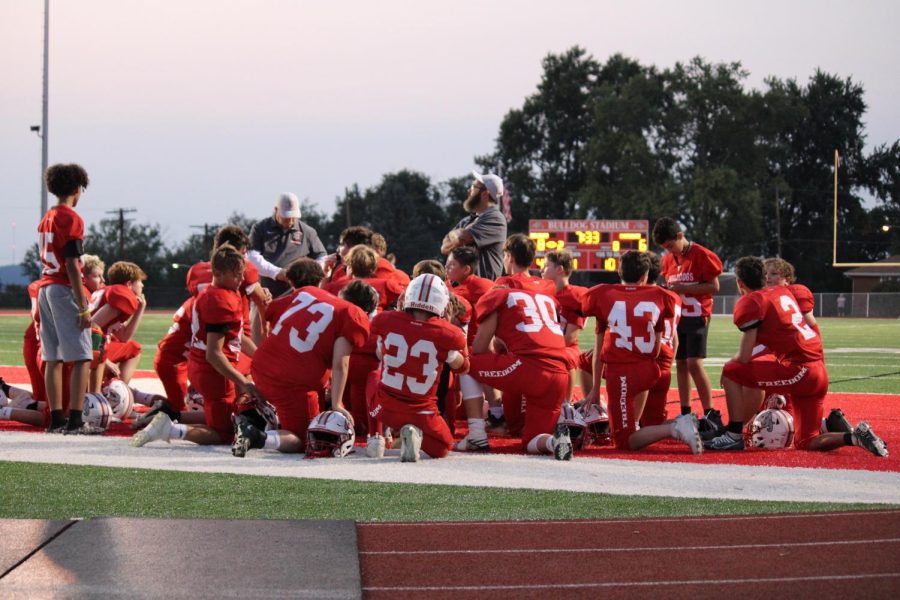  Coach Leasha talks to the boys at halftime talking over their next attack at the game at Bulldog Stadium on Wed., Sept. 14.