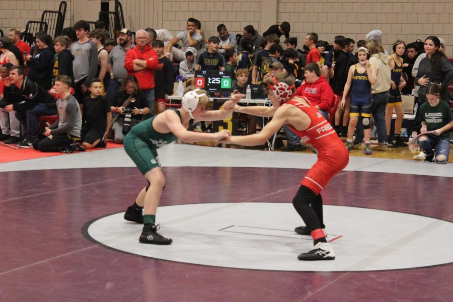 Zachery Shiring wrestling Micheals, from Laurel, at the MAC tournament  hosted by Freedom on January 6, 2023
