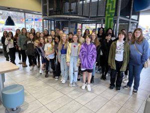 The chorus at McDonalds ready to eat their food.
