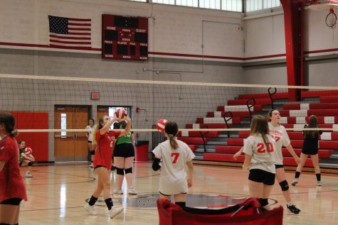 The volleyball team getting ready for their game on March 23. 