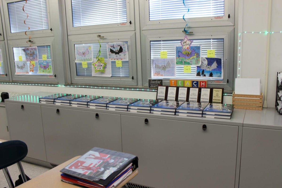 Mrs. McCanna’s vent with books stacked up to block the noise and the cold air from coming out.
