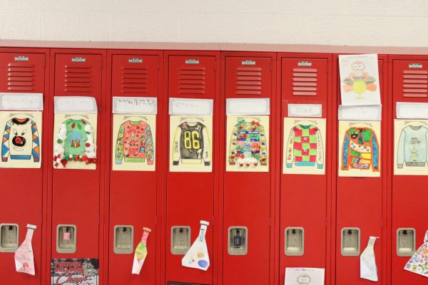 Students’ ugly Christmas sweaters on lockers.
