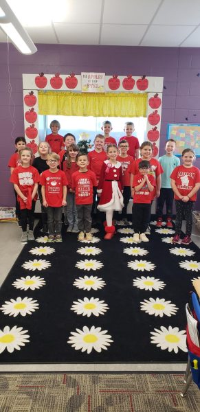 Mrs. Sacco’s class  lined up wearing their red shirts on Friday.
