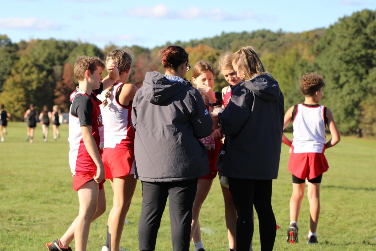 MAC Race at Brush Creek Park, MS XC Team, (MAC Mid American Conference) Coach Spencer and  Coach Santa getting the students ready for the race.