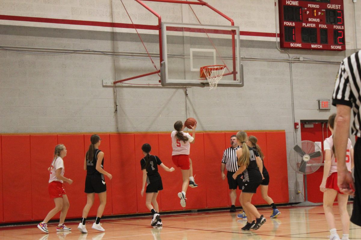 Kaitlin Evans going up for a layup.