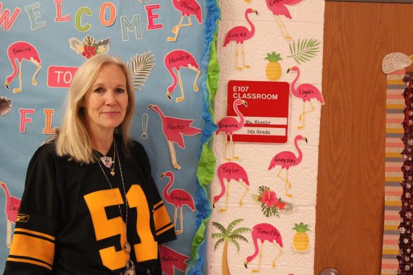  Mrs. Perry standing in front of Mrs. Nicely's room since she has already retired.