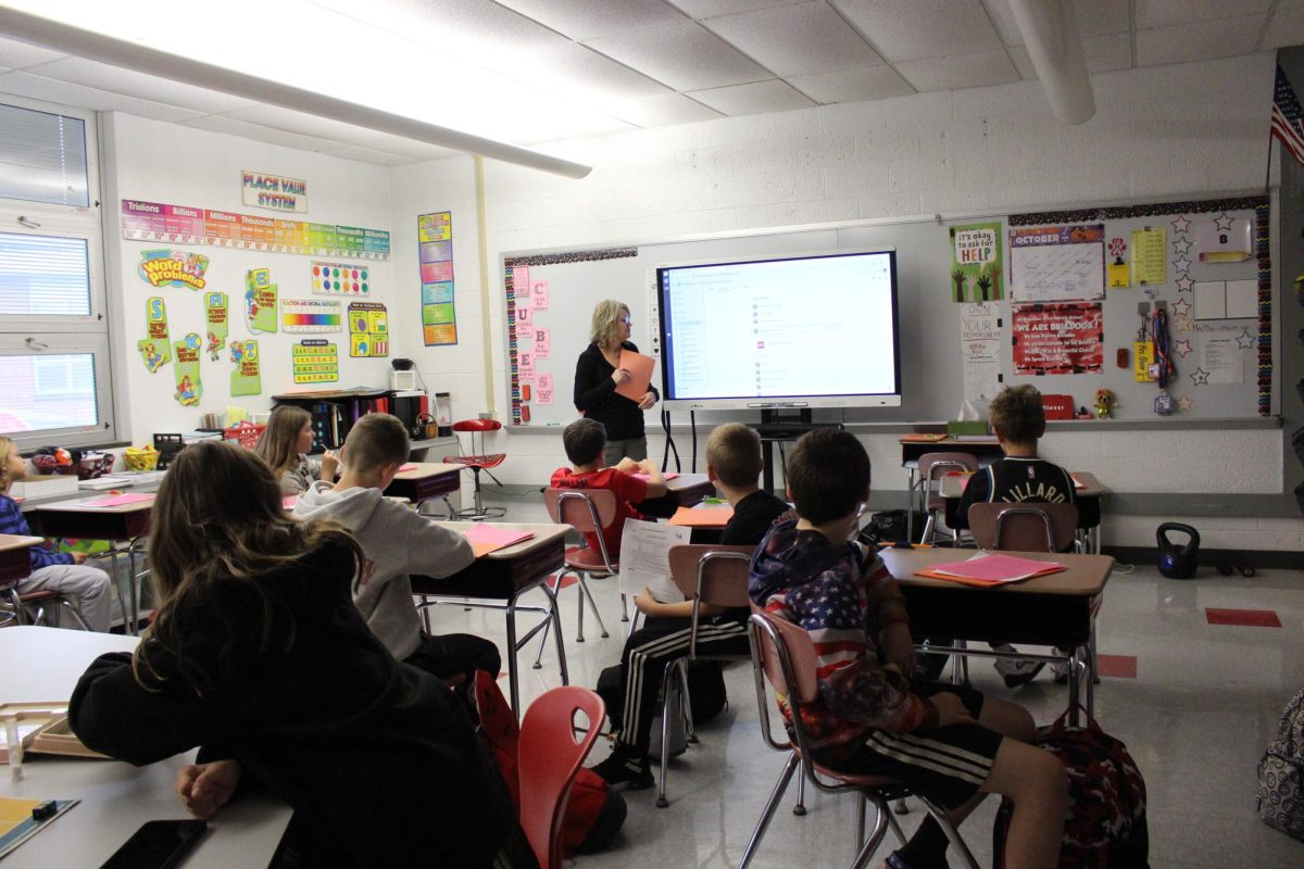 Students learn how to play equations in Ms. Glover’s  room after school on Oct. 23.