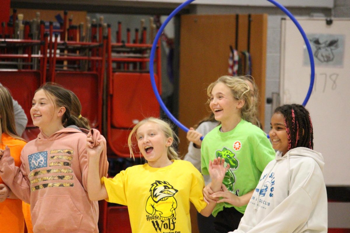 Fifth grade students celebrate after their corner didn’t get called out in the final rounds of Four Corners.