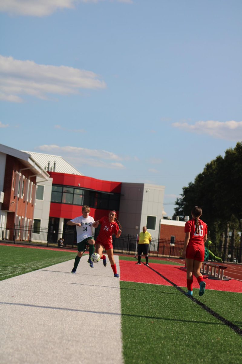Lilly Rachuba fights for the ball against a co-ed Carlynton player, on Sept. 8.