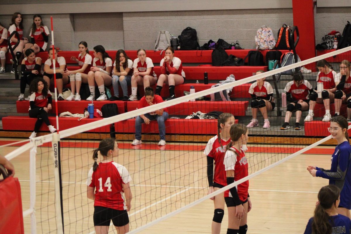 Students Alexa Straile (8)  and Tia kaufman (8)getting ready to switch positions at a home game last year.