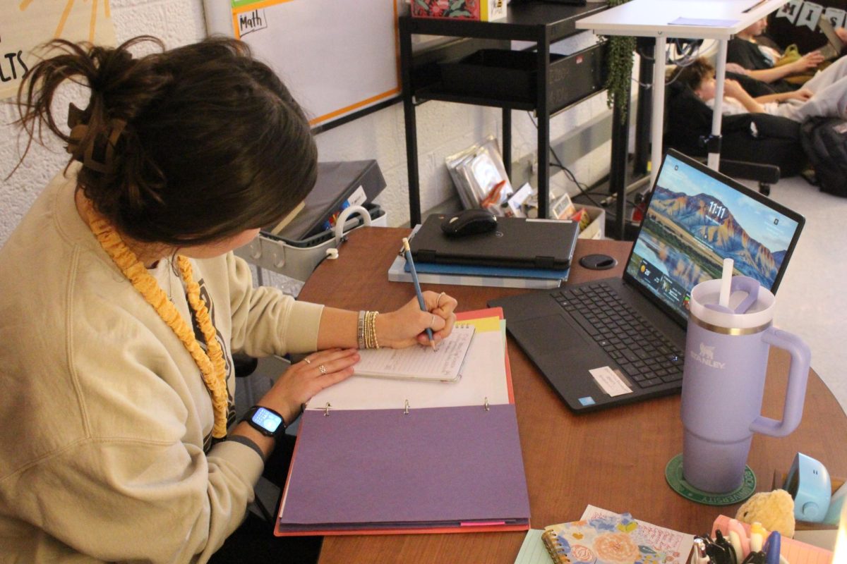 Ms. Evans works at her desk on Feb. 2